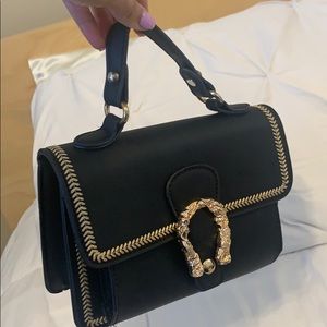 Cute small black and gold purse